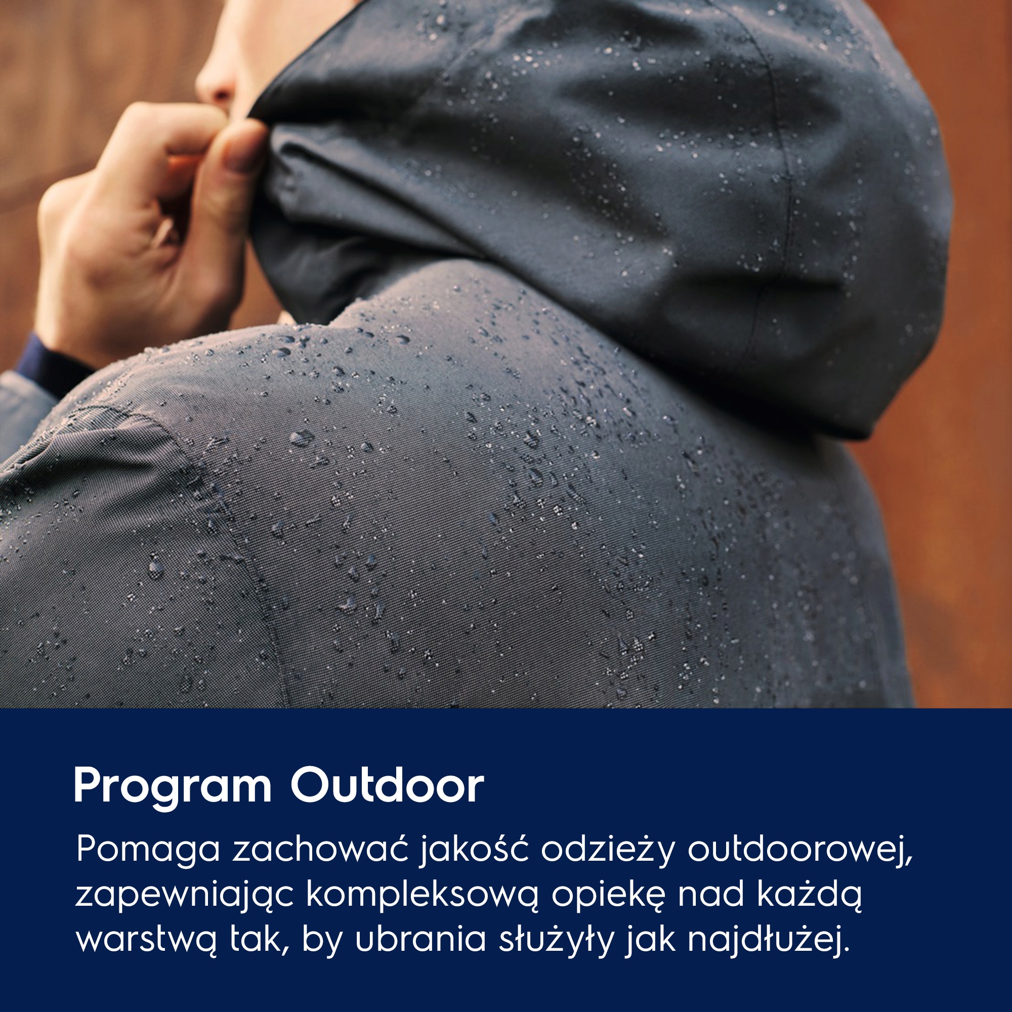 A photo of a waterproof hooded jacket with water droplets running down it