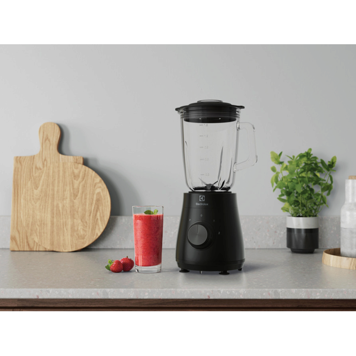 Table blender E3TB1-4GG on the kitchen table next do delicious dish