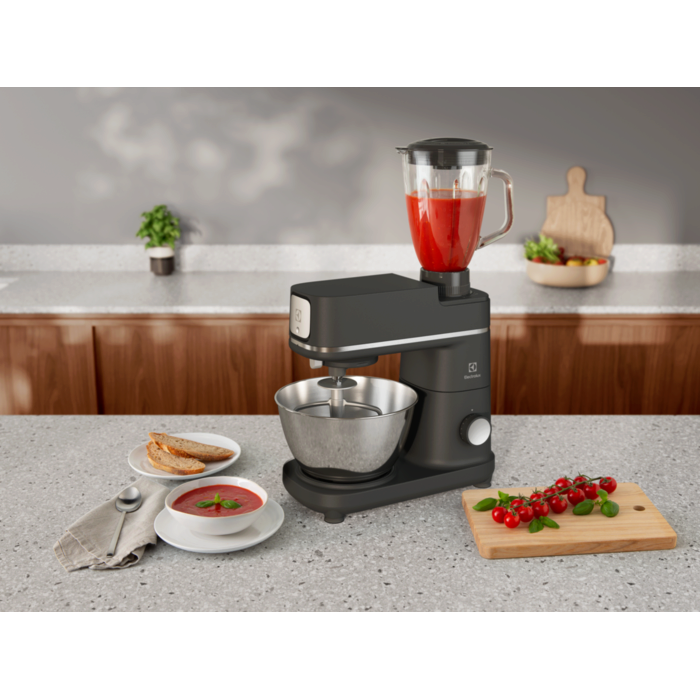 Black kitchen machine E6KM1-8BPT on the kitchen table