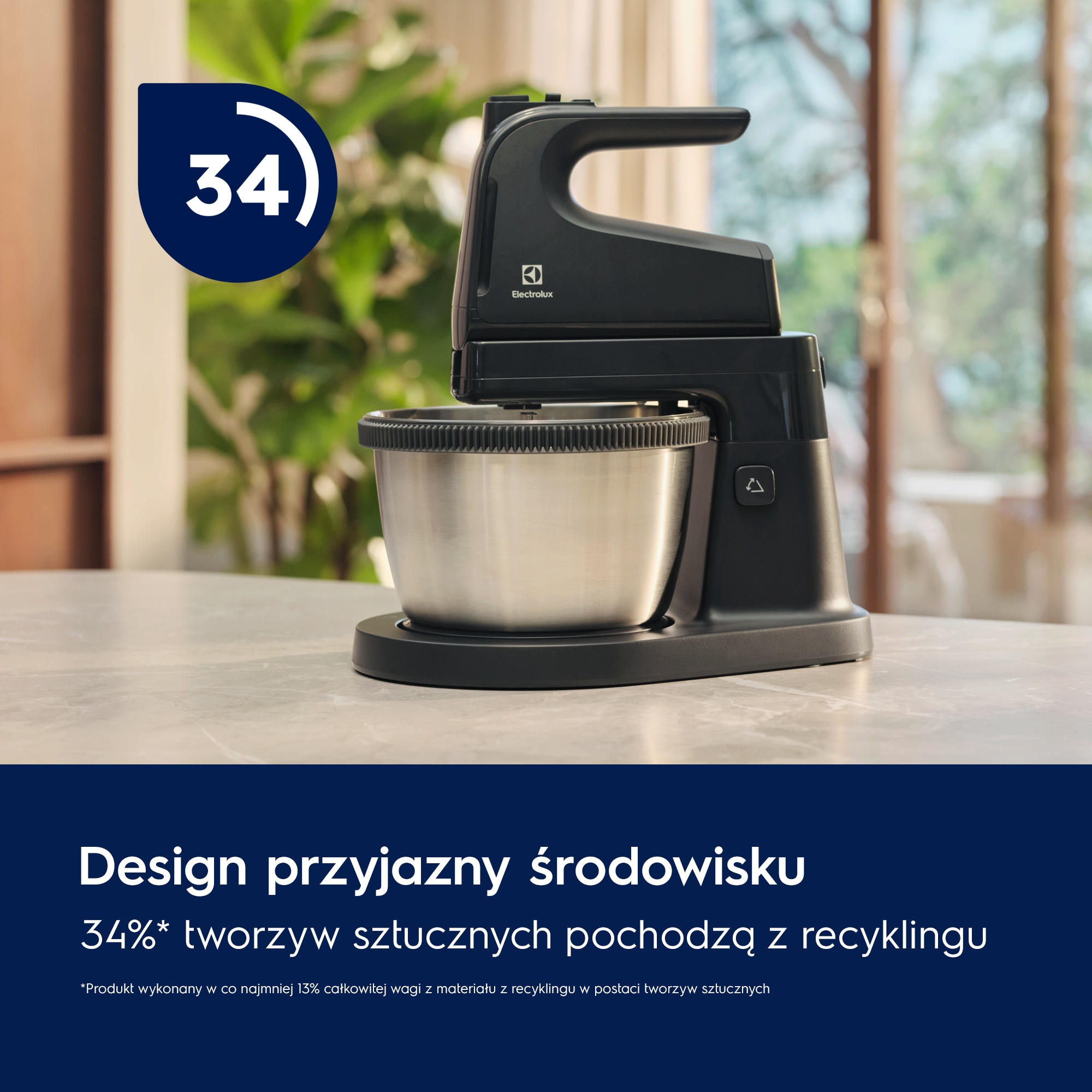 A photo of a black mixer with a bowl featuring number 34 in a blue circle