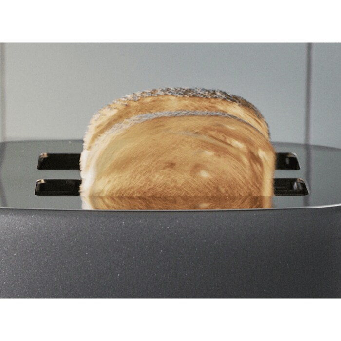 A picture of pair of toast sticking out of the toaster