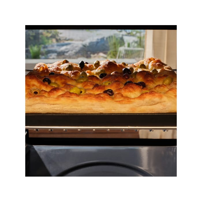 A focaccia baking inside the pizza expert oven 