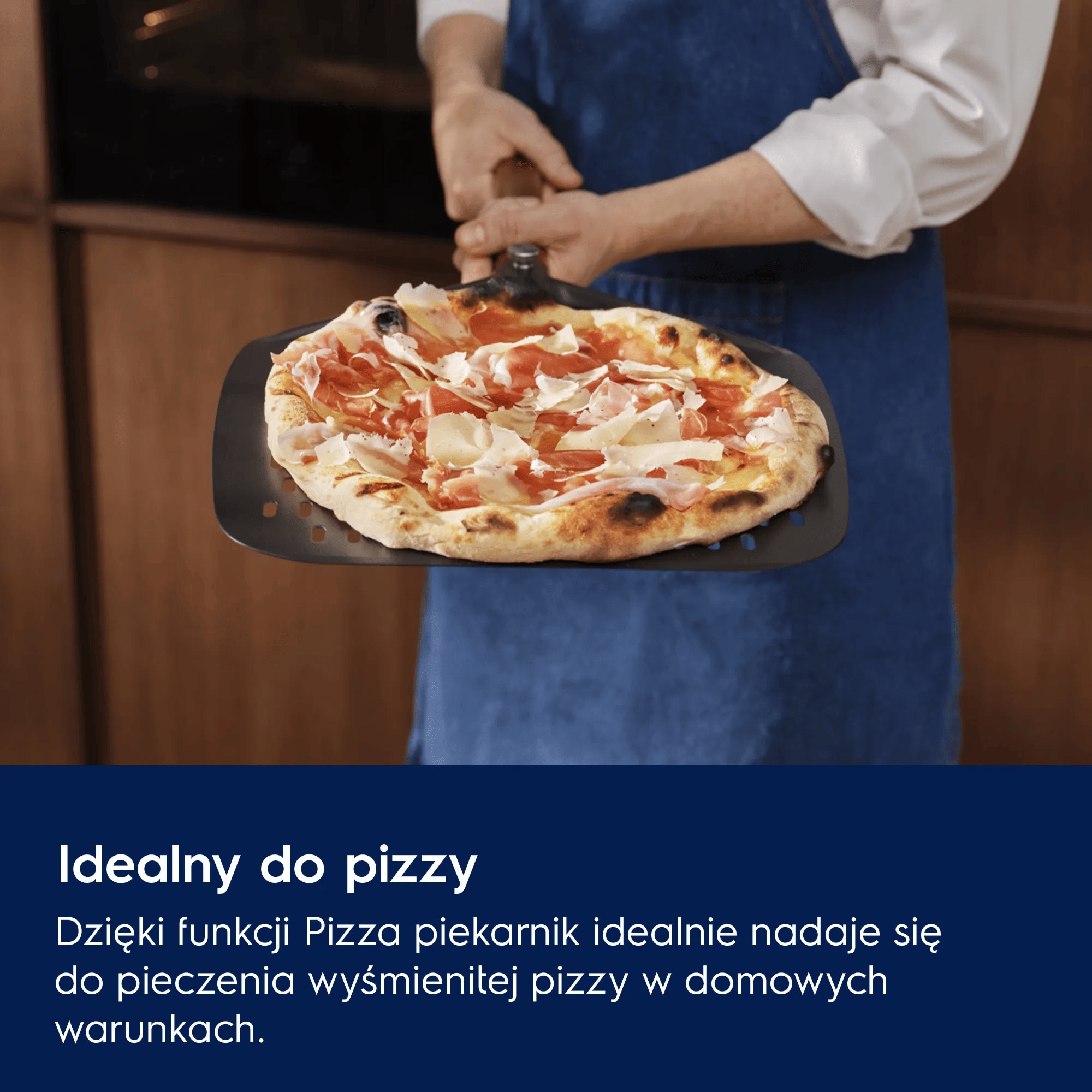 Open oven with a freshly baked pizza topped with pepperoni, mushrooms, and melted cheese on the top