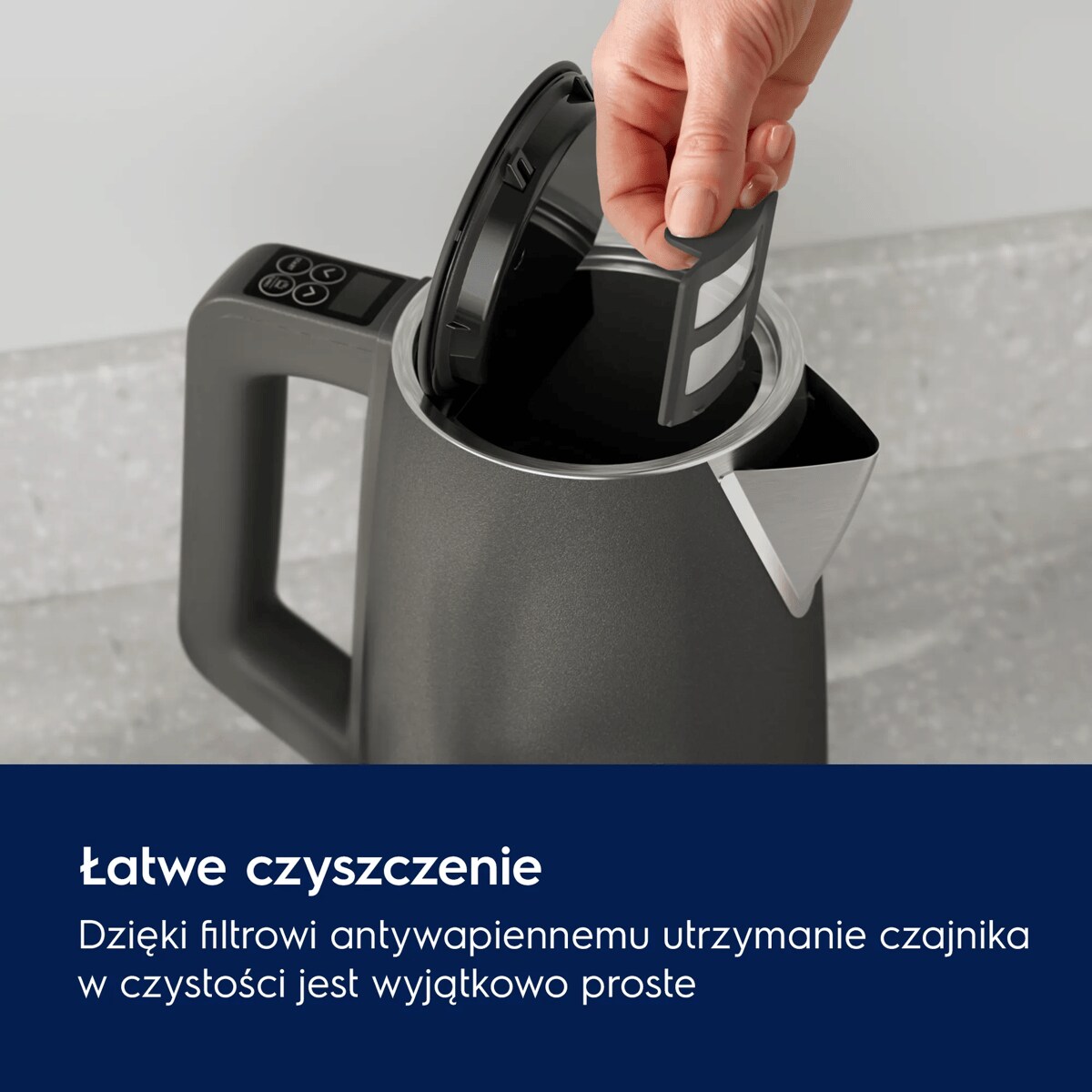 A photo of a black kettle Create 5 showing the advantages of the limescale filter