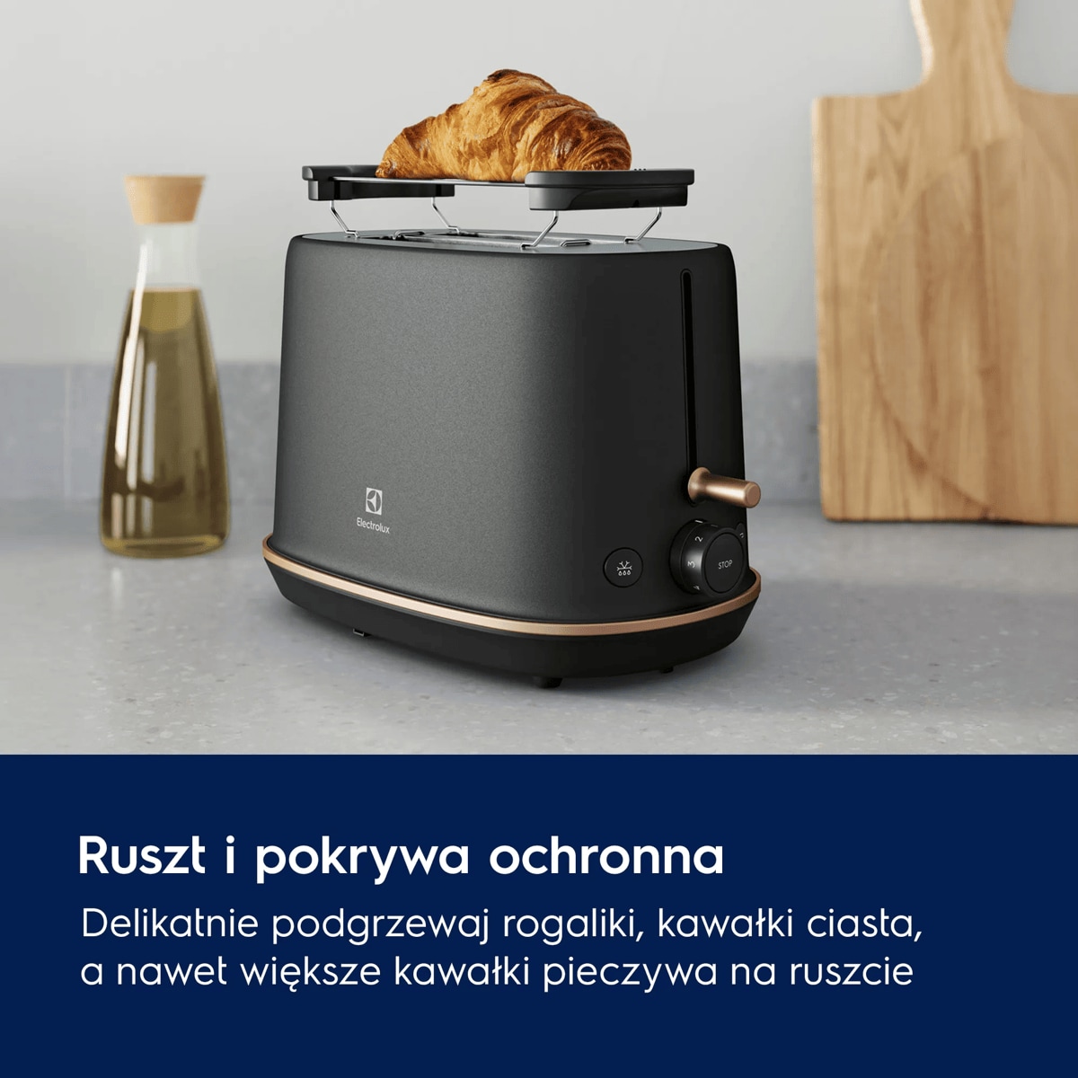 A picture showing croissant on a toaster's warming rack
