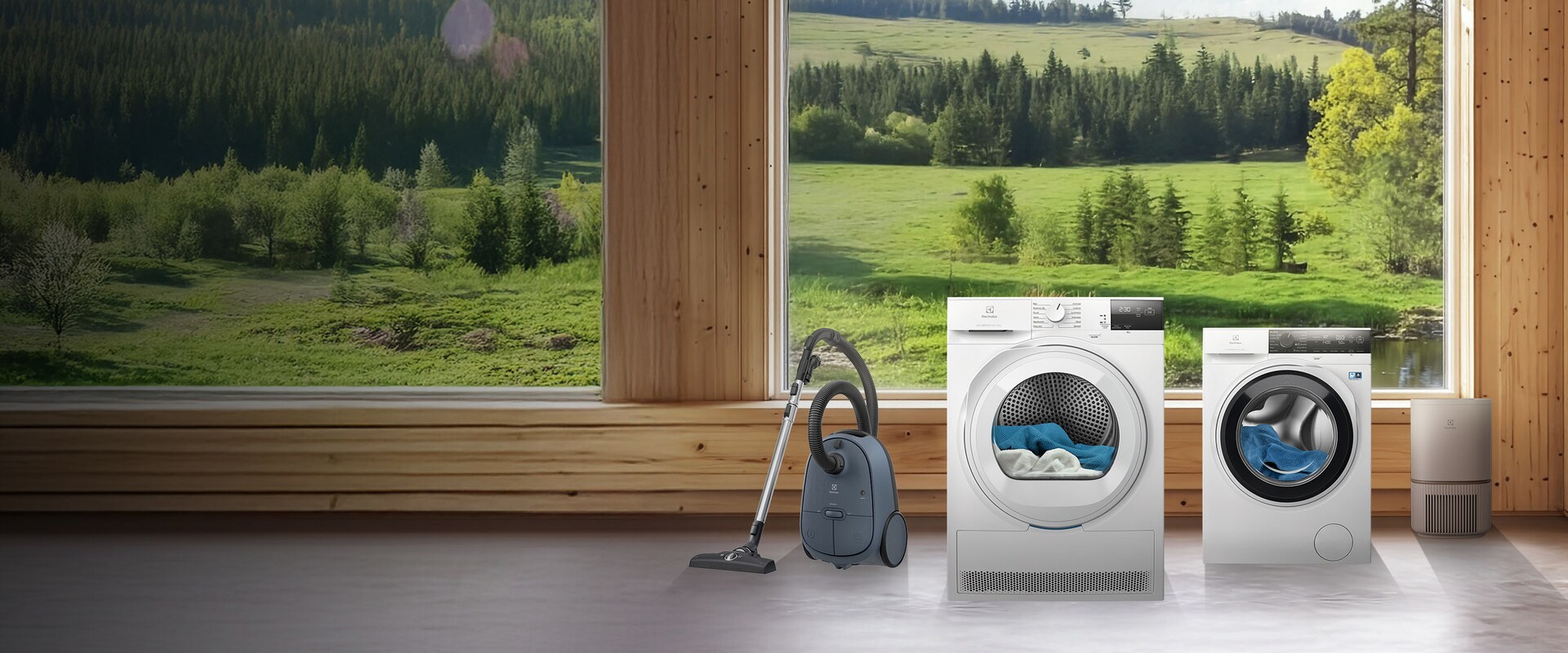 AGD od Electrolux w dobrze oświetlonym pokoju z dużym oknem z widokiem na zieloną łąkę